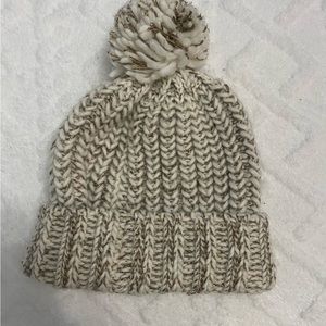 White and gold hat